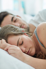 Image showing Sleeping, peace and couple in a bed with love, safety and security, comfort and bonding in their home. Relax, sleep and people in a bedroom with nap, snooze or lazy morning, dream or rest in a house
