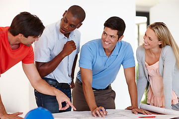 Image showing Architect, team and blueprint for construction, planning or project development at building site. Engineering, diversity and contractors for discussion, meeting or collaboration on home renovation