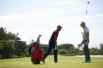 Image showing Frustrated, men and golf with disappointment, anger for mistake at losing match or game. Upset, man and sport fail with coach or friend for stress, training and goal target on field with green grass