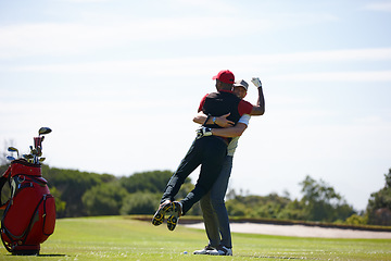 Image showing Men, hugging and golf course for victory, sports and game challenge for hobby in summer travel outdoor. Golfer or friends and excited with equipment for celebration win on field on trip on vacation