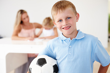 Image showing Boy, football and smiling in portrait at home for after school summer sports, training and playing with friends. Child, happy and excited for fitness exercise, soccer practice or fun workout