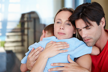 Image showing Parents, boy and hug in embrace for support, development and growth with eyes closed at home. Woman, man and young child in comfort, childcare and parenthood in bonding, relationship and family