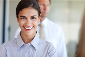 Image showing Woman, smiling and professional in portrait for corporate employment, office job or career opportunity. Girl, happy or cheerful for assistant work, occupational growth or media publishing sales