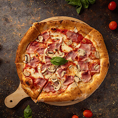 Image showing Delicious pizza with ham and mushrooms