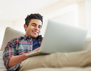 Image showing Man, laptop and sofa for relax connection with streaming service for free time, stress relief or resting. Male person, smile and couch with technology for online subscription, watching or internet