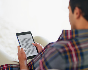 Image showing Man, tablet and ebook or reading screen for relax weekend or literature learning for information, research or online. Male person, hands and internet in apartment for connection, subscription or home