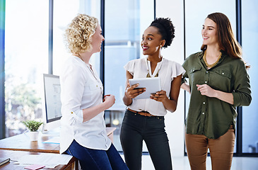 Image showing Business people, women and tablet with teamwork, planning and startup with research in a modern office. Cooperation, staff and employees with tech, partnership and creative agency with PR consultant