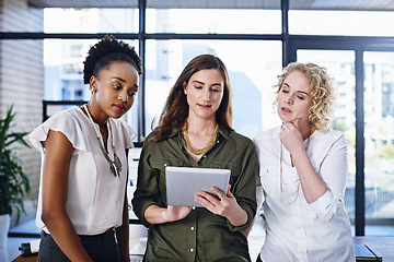 Image showing Business people, women and tablet with brainstorming, project and PR consultant with research in a modern office. Teamwork, staff and employees with tech and creative agency with ideas and planning