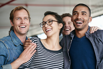 Image showing Business people, group hug and laugh for celebration, success and smile together for solidarity in creative startup. Team, happy friends and funny designer with goal achievement, support or diversity