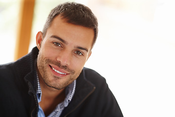 Image showing Portrait, happy man and relax in house for peace with smile, teeth and self care. Calm, happiness and face of handsome male person in home interior for wellness, positive mindset and casual comfort