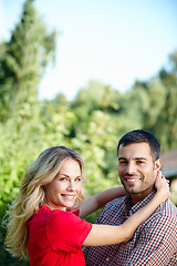 Image showing Couple, hug and smile in park portrait, love and commitment to relationship in outdoor nature. Happy people, bonding and embrace in marriage, romance and together on vacation or holiday date by trees