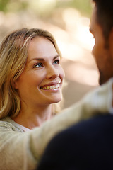 Image showing Couple, hug and looking in park for love, care and commitment to relationship in outdoor nature. Happy people, bonding and embrace in marriage, romance and together on vacation or holiday date