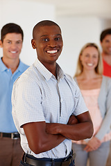 Image showing Portrait, black man and smile in office with pride for working, business and group. Male worker, professional and happy in workplace with support for design employee, creative and cooperation