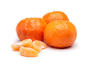 Image showing Fruit, tangerine and slice for vitamin c, diet and healthy nutrition on isolated white background. Food, closeup and organic for natural wellness, health and fresh produce on studio backdrop