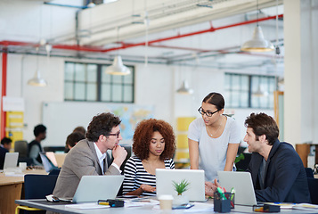 Image showing Diversity, technology and teamwork at office for discussion with agency, collaboration and graphic design. Global people, laptop and ux in workplace for creative startup, brainstorming and website