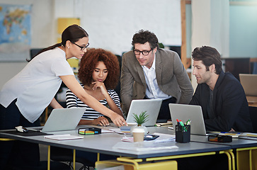 Image showing Diversity, technology and collaboration at office for discussion with agency, teamwork and graphic design. Global people, laptop and ux in workplace for creative startup, brainstorming and website