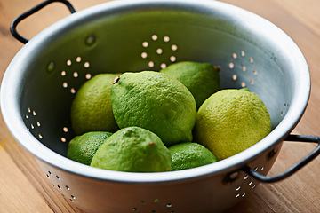 Image showing Fruit, lime and healthy food for snack, nutrition and wellness with citrus for vitamin c or detox. Organic ingredients, fresh green produce with balance in diet, sweet or sour for juice or lemonade