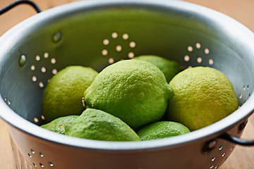 Image showing Closeup of fruit, lime and healthy food for snack, nutrition and wellness with citrus for vitamin c or detox. Organic ingredients, fresh green produce and balance in diet, sweet or sour for juice