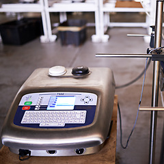 Image showing closeup, industrial and scale in warehouse for weight of packages, stock and distribution process. Production measurement, shipping and packaging service in automated factory for freight assistance