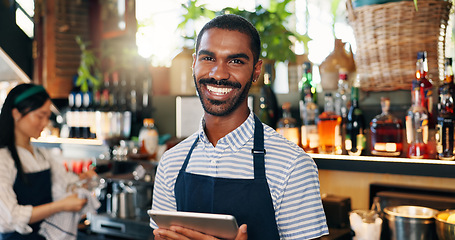 Image showing Tablet, black man and bartender smile for restaurant sales, alcohol service or career vocation. Portrait, job experience and African business owner with pride in drinks trade, supply chain or startup