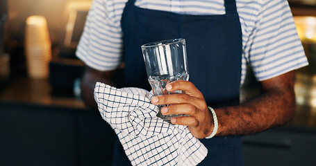 Image showing Hands, waiter and cleaning a glass in restaurant for dust, dirt or bacteria with maintenance and workflow. Barista, man and cleaner in cafe, coffee shop or small business for disinfection and hygiene