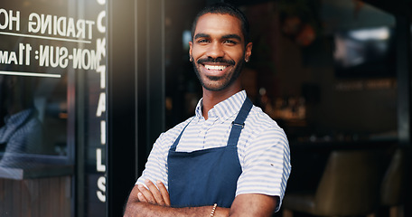 Image showing Smile, crossed arms and face of barista at cafe for welcome with positive and confident attitude. Happy, portrait and young male waiter or entrepreneur at startup coffee shop or restaurant entrance.