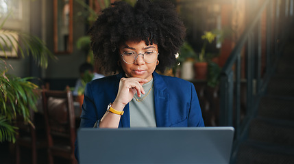 Image showing Woman, thinking and restaurant with laptop, remote work and ideas for job, online and internet. Concentrating, planning and journalist for freelance career, copywriter and working on project