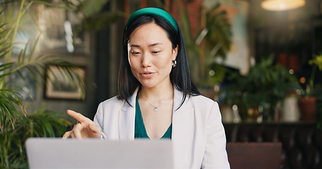 Image showing Woman, video call and restaurant with laptop, remote work and conversation for project, meeting and internet. Discussion, job and explain feedback to copywriter and working on social media campaign