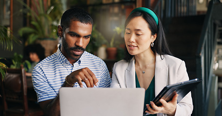 Image showing Business people, laptop and tablet at cafe for research, schedule planning or design in creative startup. Happy man and woman working with technology on project, brainstorming or ideas at coffee shop