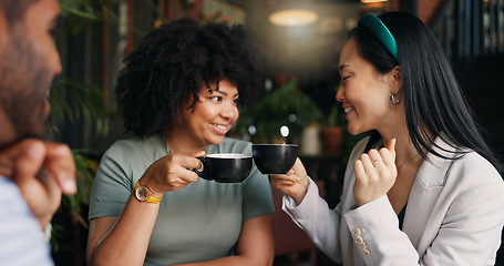 Image showing Happy people, friends and talking with coffee at cafe for social, free time or catch up break together. Group smile and enjoying conversation with beverage, drink or cup of tea at indoor restaurant