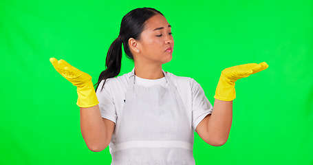 Image showing Cleaning, presentation and happy with woman on green screen for idea, choice and decision. Advertising, hygiene and show with portrait of person on studio background for offer, opinion and mockup