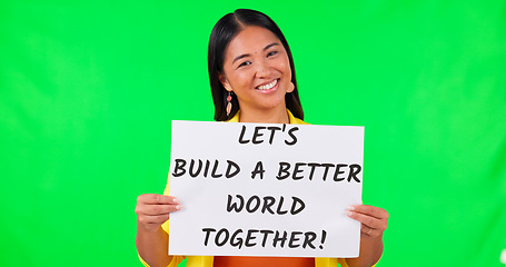 Image showing Poster, motivation and message with an asian woman on green screen background in studio for the future of the world. Portrait, sign and challenge with a happy young female person on chromakey mockup