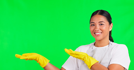 Image showing Cleaning, presentation and space with woman on green screen for idea, choice and decision. Advertising, hygiene and show with portrait of person on studio background for offer, opinion and mockup