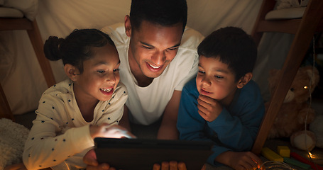 Image showing Night, father and children with a tablet, streaming movies and happiness with bonding, family and loving together. Evening, male parent and kids with technology, playful and fun with online videos