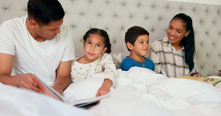 Image showing Mom, dad and happy kids in bedroom with reading book, teaching and fun learning in family home. Happiness, fantasy and parents relax on bed with laughing children, love and funny storytelling time.