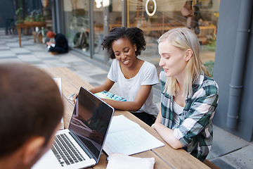 Image showing Students, group and study outdoor at university with books, laptop and learning for education and campus. Friends, gen z people and teamwork research with smile, diversity and college break by table