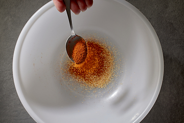Image showing spoon of ground dried paprika spice