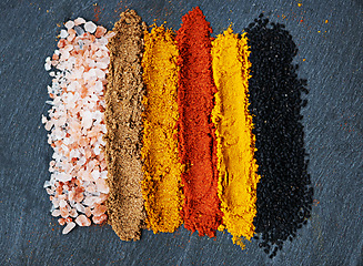 Image showing Row, spice and selection of powder for cooking, turmeric and paprika for meal. Top view, condiments and options for spicy gourmet in Indian culture, cumin and food preparation in closeup for aroma