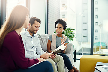 Image showing Business people, teamwork and meeting for brainstorming, notebook and schedule for magazine. Journalist, graphic design and editing with social impact and culture article with calendar and deadline