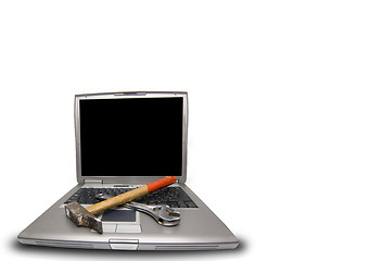 Image showing laptop and tools