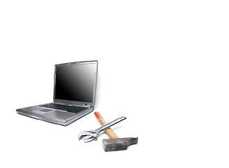 Image showing laptop and tools