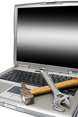 Image showing laptop and tools