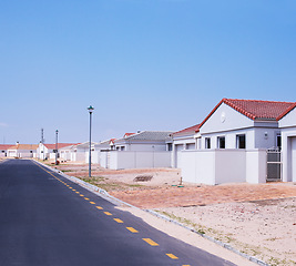 Image showing Street, homes and houses in neighborhood, residential area or community in Dallas, Texas in USA. Background, property development or suburban real estate for investment project and society in town