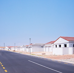 Image showing Road, homes and houses in neighborhood, community or residential area in Dallas, Texas in USA. Background, property development and suburban real estate for investment project and society in town