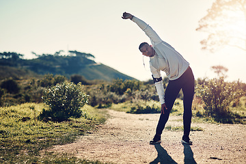 Image showing Fitness, stretching arms and black man in mountain with headphones, health and wellness for outdoor run. Body workout, warm up and athlete in nature with music, earphones and exercise on natural path