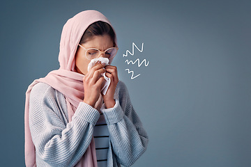 Image showing Flu, sick and woman with hijab in studio with toilet paper allergies and runny nose. Muslim female person, gray background and sinus symptoms for ill health with hayfever, covid 19 virus and sneezing