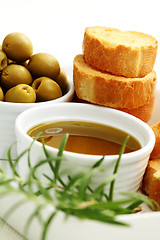 Image showing baguette and olive oil