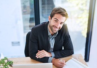 Image showing Portrait, business and man writing, smile and lawyer with notes for court case and computer. Laptop, legal aid and advocate with planning and research for defense and attorney in modern office