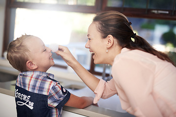 Image showing Happy, parent and child in kitchen cleaning for education, development and family teamwork. Smiling, mother and kid working together for teaching, hygiene or learning healthy habits and bonding