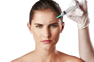 Image showing Woman, portrait and hand with needle in forehead or wrinkles plastic surgery, cosmetics or face lift. Female person, injection and frown for anti aging results in studio, white background or mockup